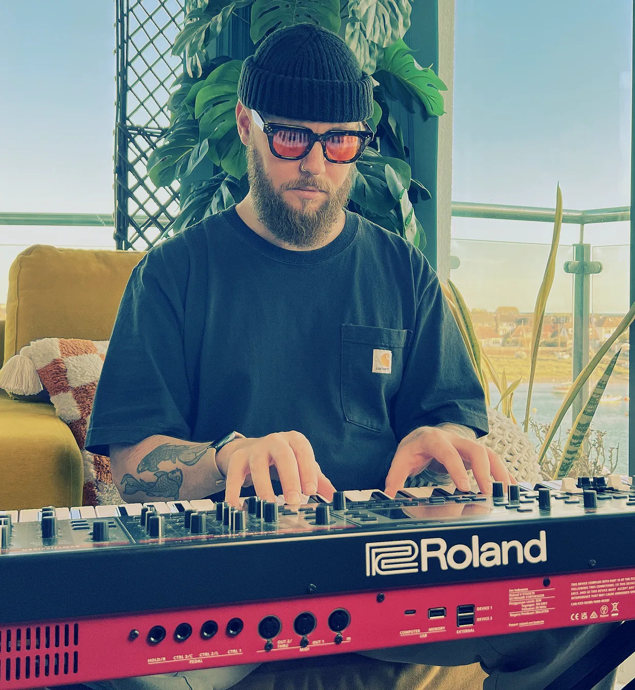 Oli Howe playing keys during a reharm session
