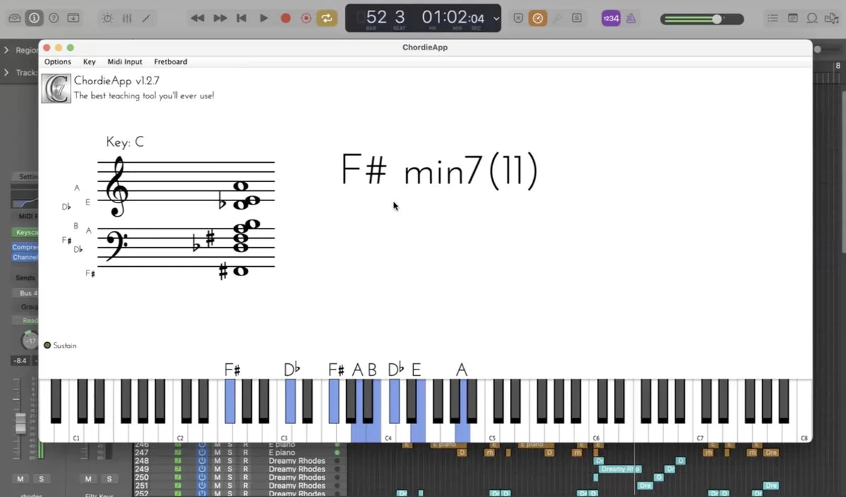 A chord app showing an F sharp minor 7 chord written on the grand stave above a piano keyboard